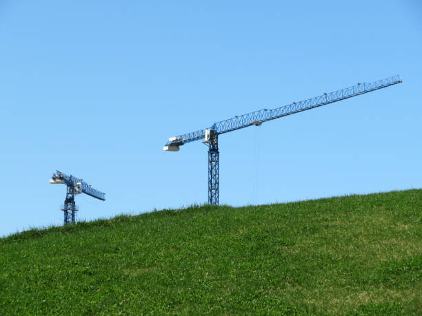 Environmentally friendly construction site, landscape with green grass, building in ecologically clean area