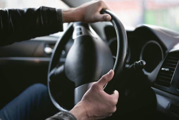 Angry driver. A driver is drifting on his car in sharp turn. Driver is lost control on the road. Automobile emergency stop to avoid an road accident. pivot stock pictures, royalty-free photos & images