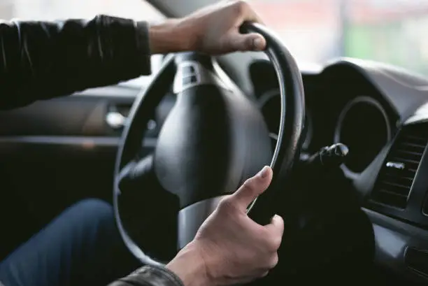 A driver is drifting on his car in sharp turn. Driver is lost control on the road. Automobile emergency stop to avoid an road accident.