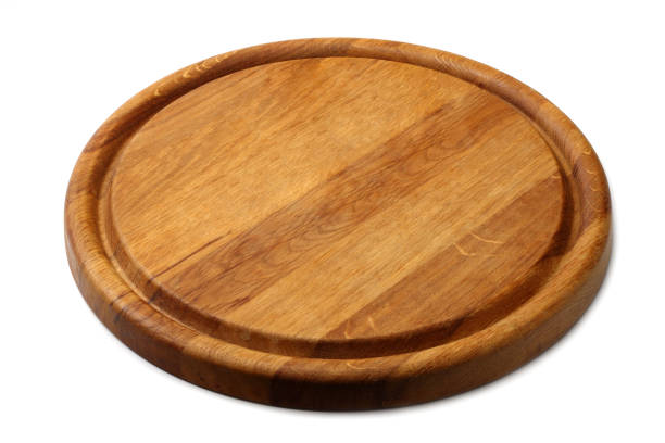 round wooden plate isolated on white background