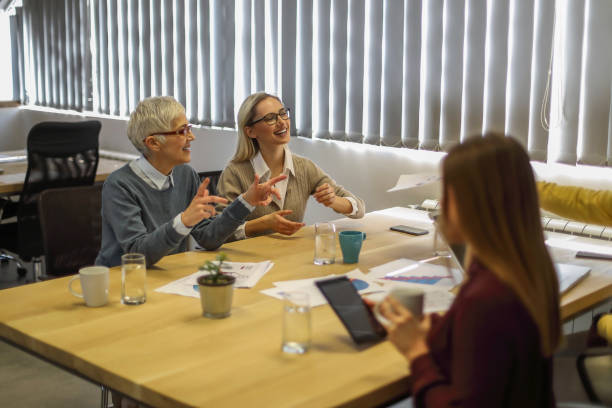 istock Multi-generation and ethnic group of colleagues at meeting 1135061571