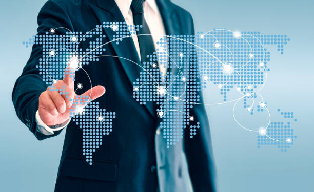 istock Businessman touching world map virtual button and connect communication. 1135061603