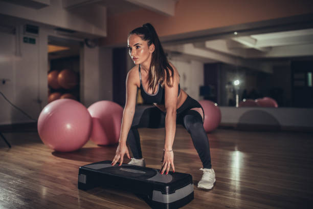 istock Beautiful woman training in gym 1135062666
