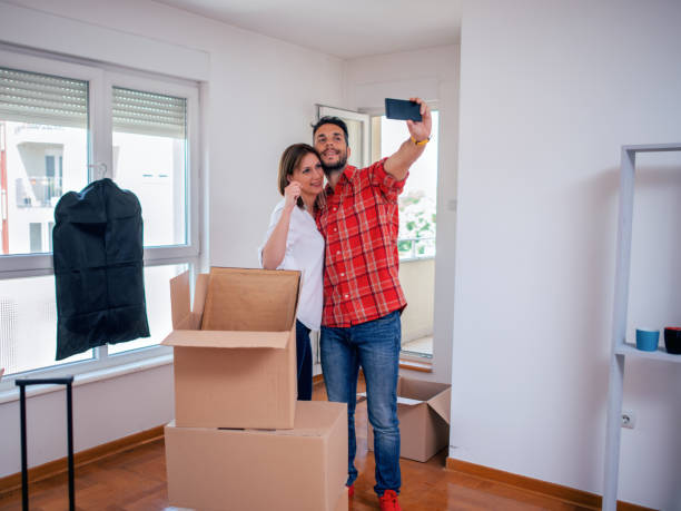 istock Couple with keys to new home 1135063878