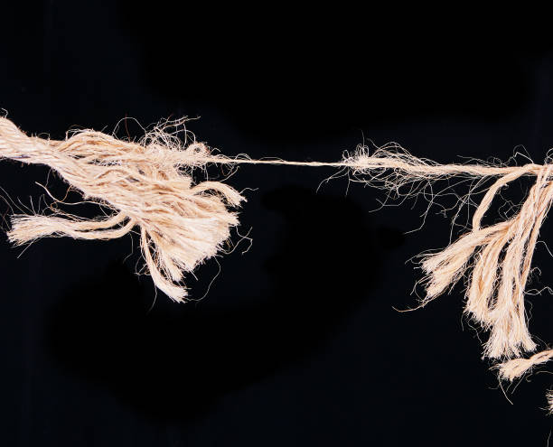 stress: a rope about to snap - rope frayed emotional stress breaking imagens e fotografias de stock