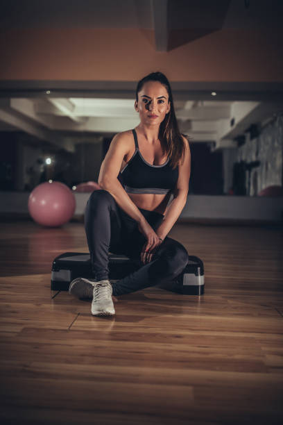 istock Lady sitting alone in gym 1135065199