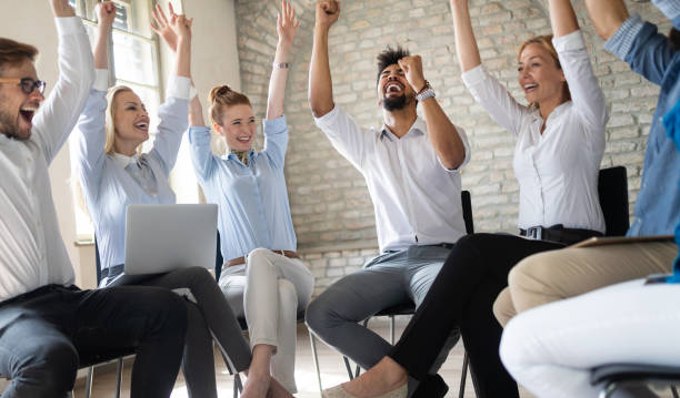istock Business, startup, gesture, people and teamwork concept - happy creative team in office 1135065827