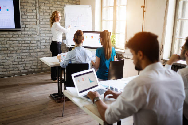 istock Business, technology and people concept - creative team or designers working in office 1135065898