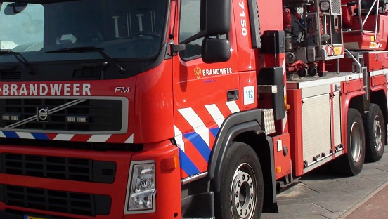 Looking At Dutch Fire Service Land Vehicle Parked On The Street Of The Hague During The Day In South Holland The Netherlands Europe