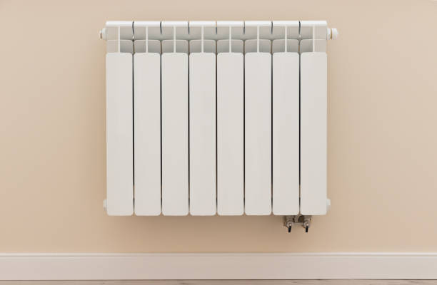 istock Modern white heating radiator on the wall 1135067046