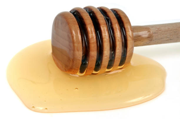 istock Wooden Honey Spoon 1135068698