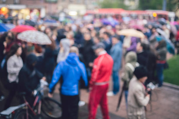 istock Group of Protesters Abstract Out Of Focus Background 1135073433