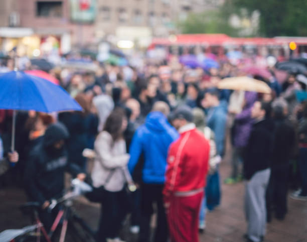 istock Group of Protesters Abstract Out Of Focus Background 1135073612