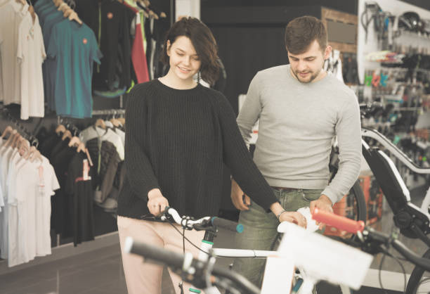 istock couple choosing sport bicycle 1135073771