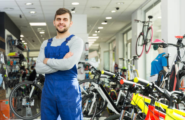 istock man worker standing in bicycle shop 1135073809