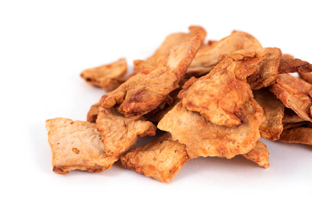istock slices of dried papaya on a white background 1135074849