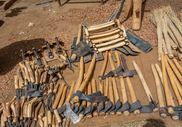 Hammer, sickle, hoe and other tools for field work in a market in Sudan, Africa