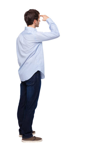 istock Back view of man in dark jeans. Standing young guy. 1135077406