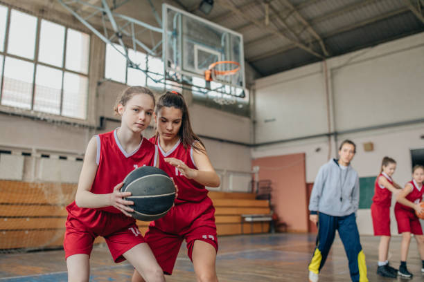 istock Basketball coach on training with her players on training 1135078068