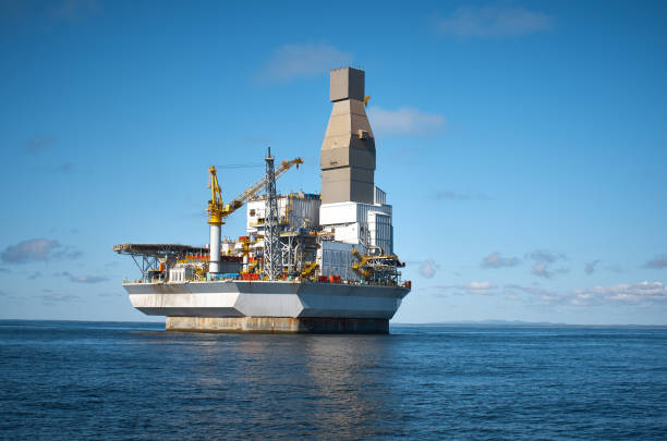 istock Drilling rig offshore area, sea and clean blue sky 1135078131