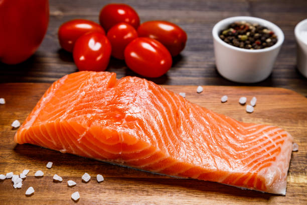 istock Fresh raw salmon steak on stone plate 1135078154