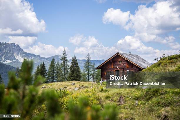 Idyllic Mountain Landscape In The Alps Mountain Chalet Meadows And Blue Sky Stock Photo - Download Image Now