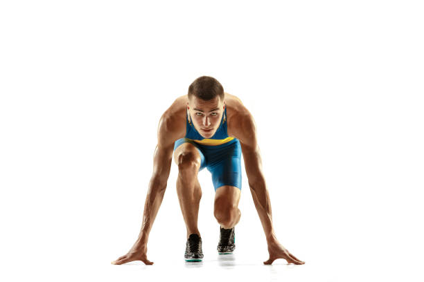 istock Young caucasian man running or jogging isolated on white studio background. 1135080125