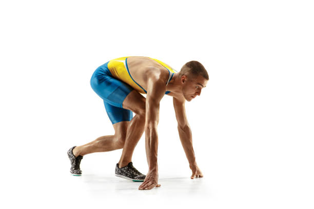 istock Young caucasian man running or jogging isolated on white studio background. 1135080131