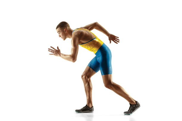 istock Young caucasian man running or jogging isolated on white studio background. 1135080142