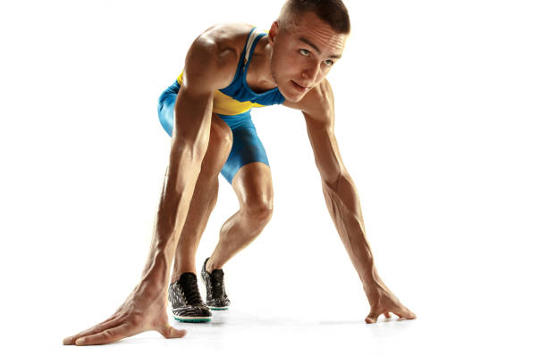 istock Young caucasian man running or jogging isolated on white studio background. 1135080144