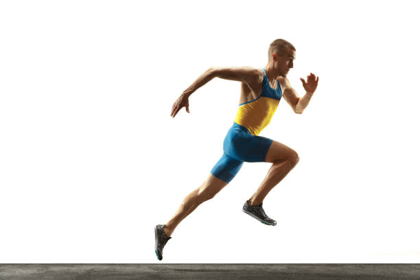 istock Young caucasian man running or jogging isolated on white studio background. 1135080156