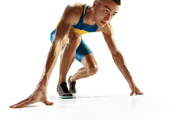 istock Young caucasian man running or jogging isolated on white studio background. 1135080157