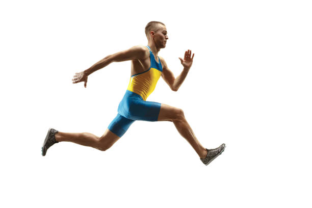 istock Young caucasian man running or jogging isolated on white studio background. 1135080162