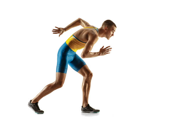 istock Young caucasian man running or jogging isolated on white studio background. 1135080169