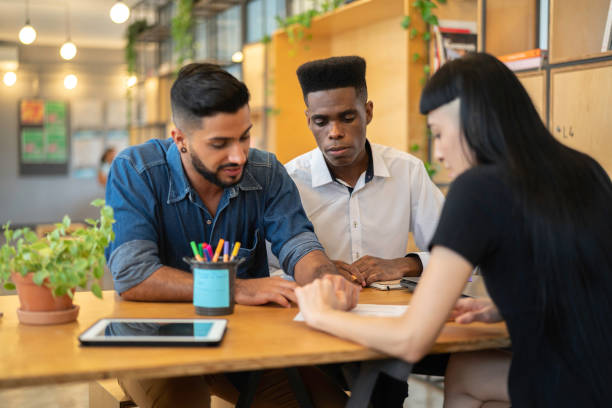 istock Multi-ethnicity coworkers discussing new ideas 1135080954