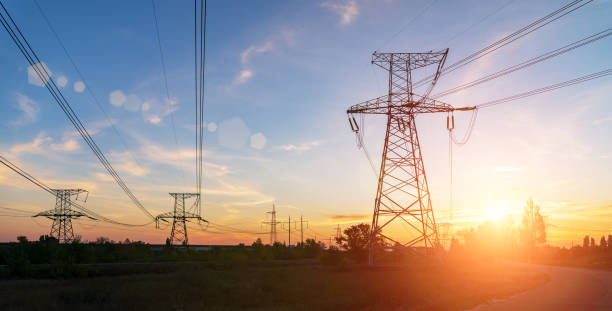 istock high-voltage power lines at sunset. electricity distribution station . 1135081243