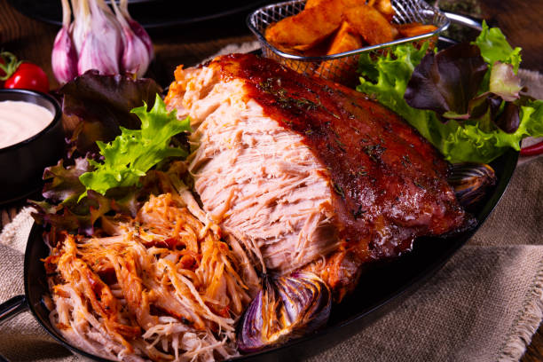 istock delicious pulled pork with baked potato quarters 1135082955