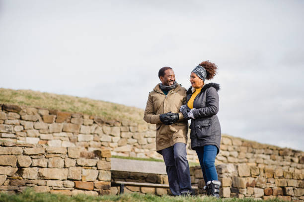 istock Couple Walking Together Outdoors 1135083030