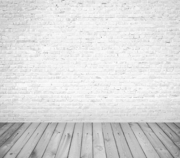 istock interior room with brick wall and wooden floor 1135083314