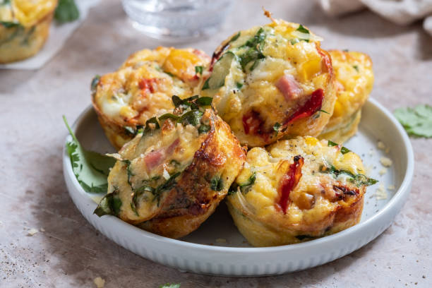 istock Egg muffins with ham, cheese and vegetables 1135083428