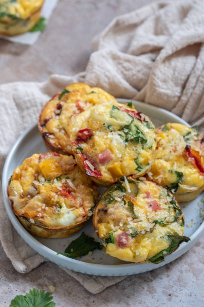 istock Egg muffins with ham, cheese and vegetables 1135083446