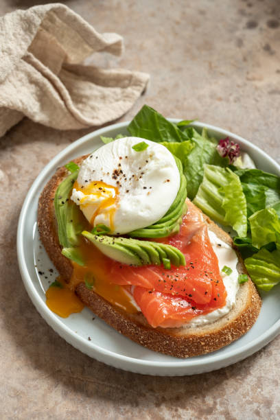istock Salmon, avocado and poached egg sandwich 1135084370