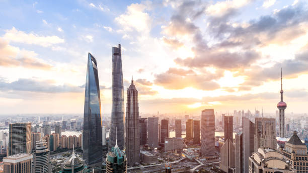 Shanghai skyline and cityscape at sunset Shanghai skyline and cityscape at sunset shanghai tower stock pictures, royalty-free photos & images