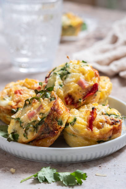 istock Egg muffins with ham, cheese and vegetables 1135084504