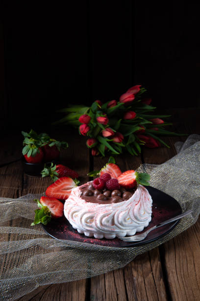 light pavlova with fresh fruits and chocolate