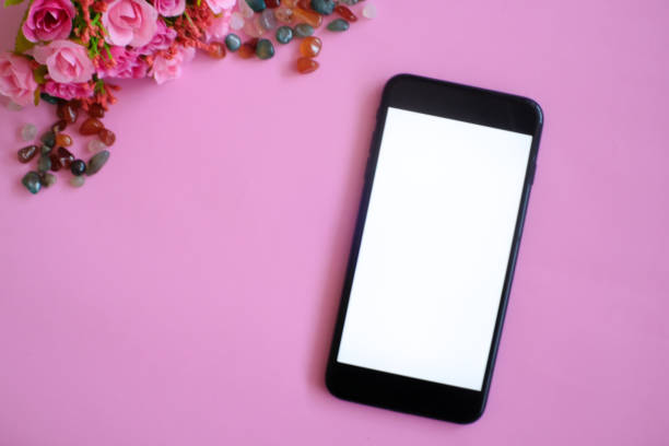 istock Mockup of smart phone on office desk. 1135087943