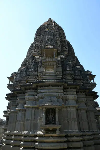 Photo of Stone masonry Shikhara with carvings of statue of Vishnu the God at Vitthal Temple, Palashi, Parner, Ahmednagar