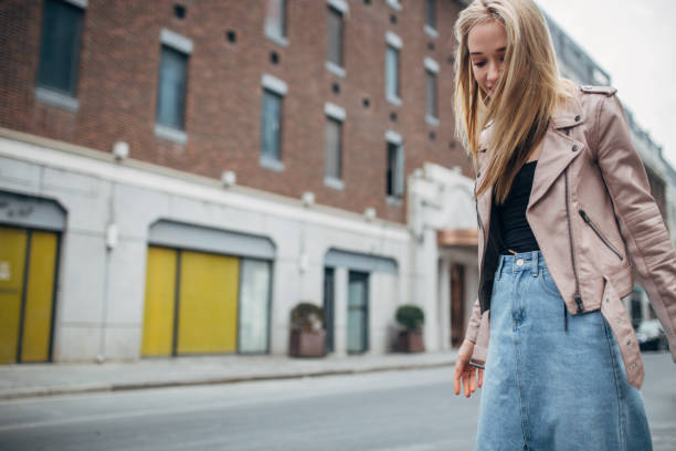 istock Blonde on the street downtown 1135091944