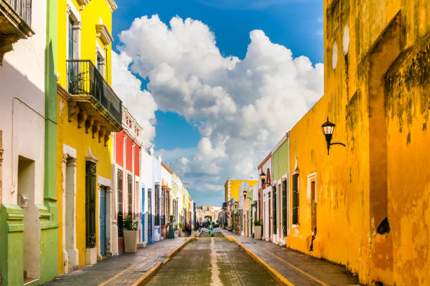 A beautiful and colorful stone alley in the historic center of San Francisco de Campeche in southern Mexico stock photo