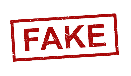 Vector illustration of the word Fake in red ink stamp